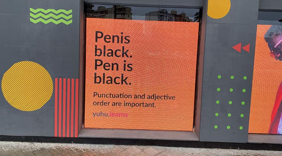 penis black - slogan that sells language in Valencia by an unortodox language school